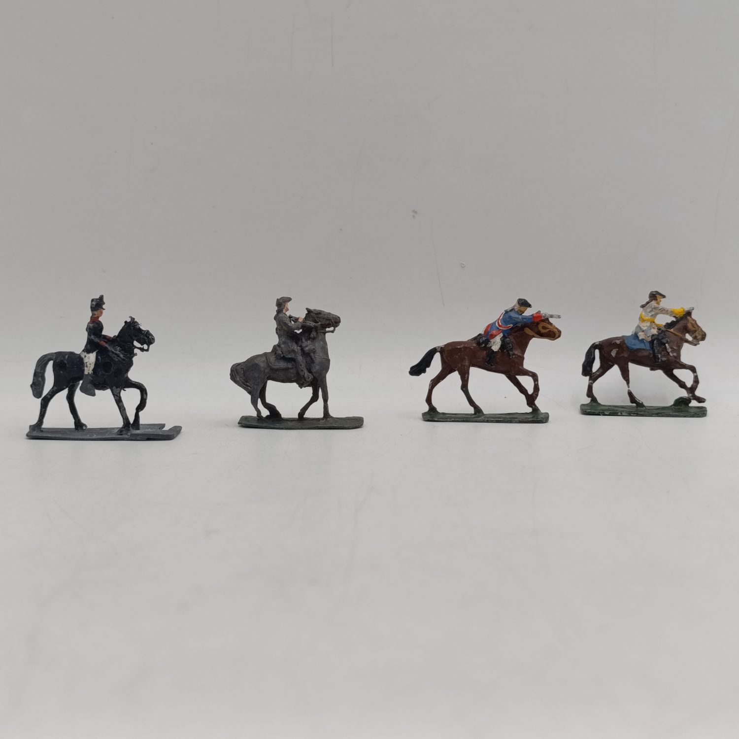 Lot of 4 vintage cavalry lead soldiers