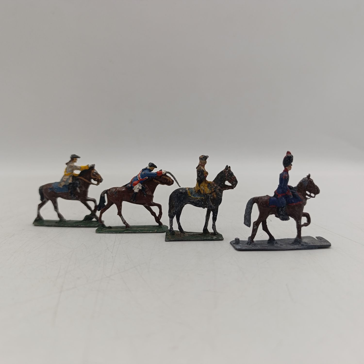 Lot of 4 vintage cavalry lead soldiers