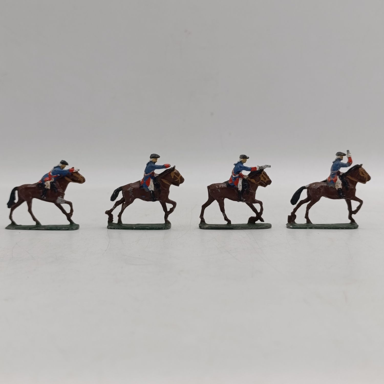 Lot of 4 vintage cavalry lead soldiers