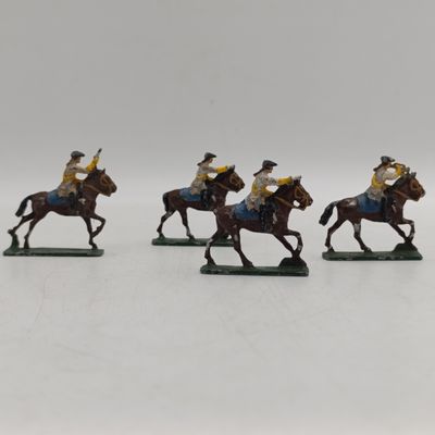 Lot of 4 vintage cavalry lead soldiers
