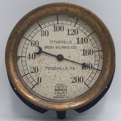 Antique brass Titusville Iron works pressure gauge