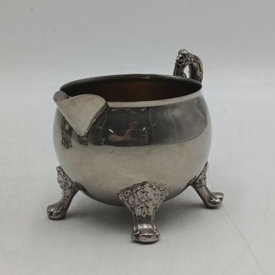 Vintage silverplated teapot with milk and sugar bowl
