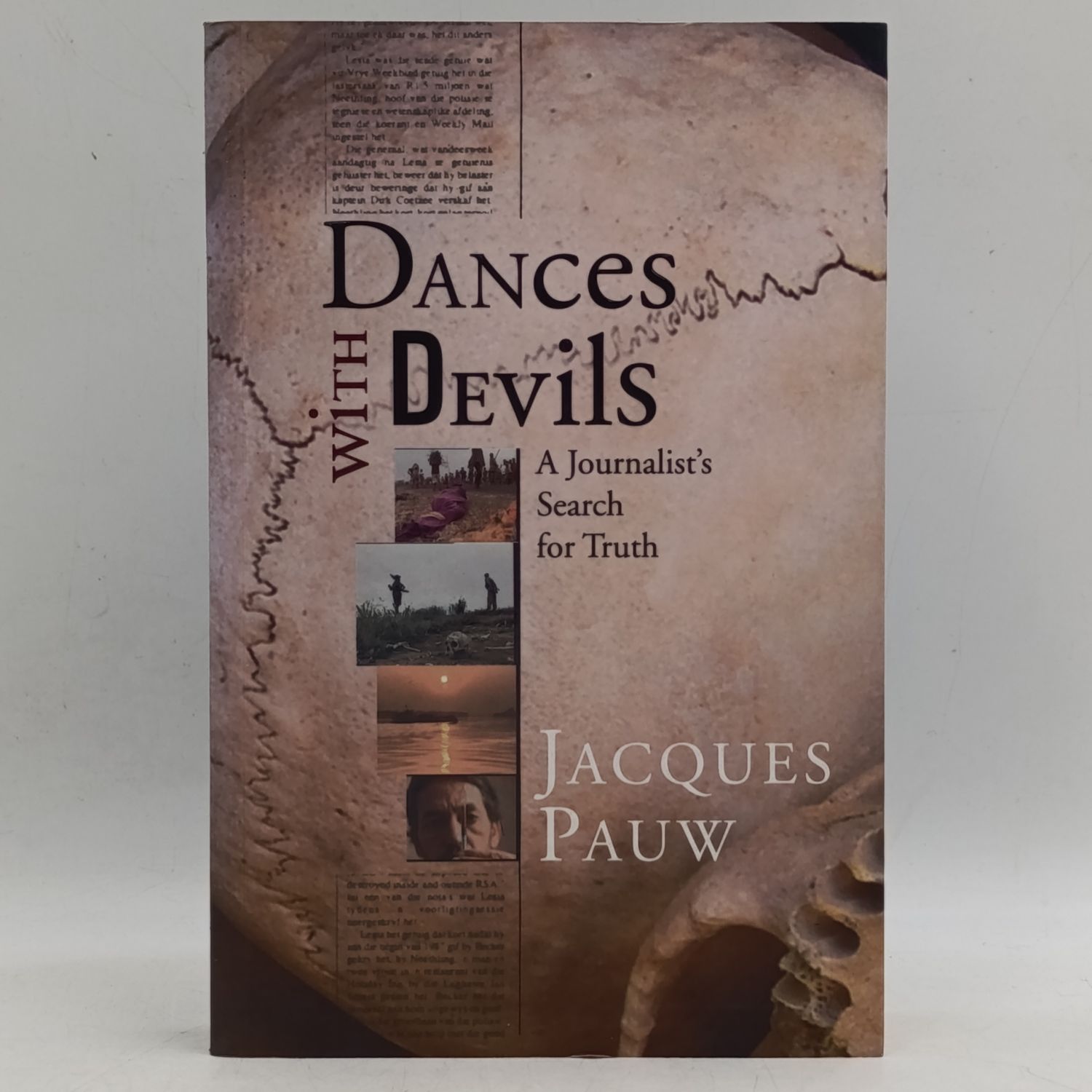 Dances with Devils by Jacques Pauw - A Journalist's Search for Truth - Pursuit of warlordsand drug trafficers. child soldiers and charlatans, adventure and anarchy.