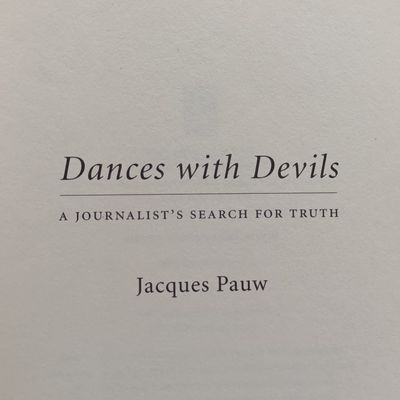 Dances with Devils by Jacques Pauw - A Journalist's Search for Truth - Pursuit of warlordsand drug trafficers. child soldiers and charlatans, adventure and anarchy.