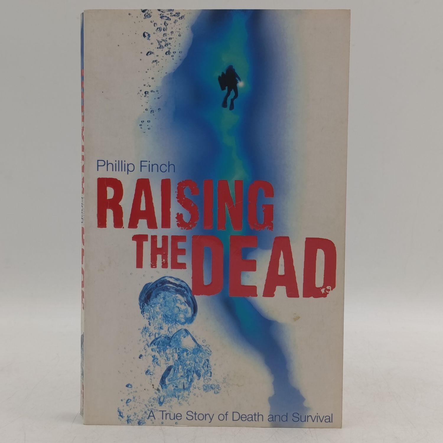 Book Raising The Dead by Phillip Finch - A True Story of death and survival
