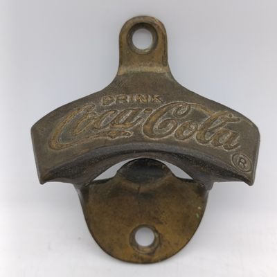 Vintage Coca-Cola under countertop bottle opener