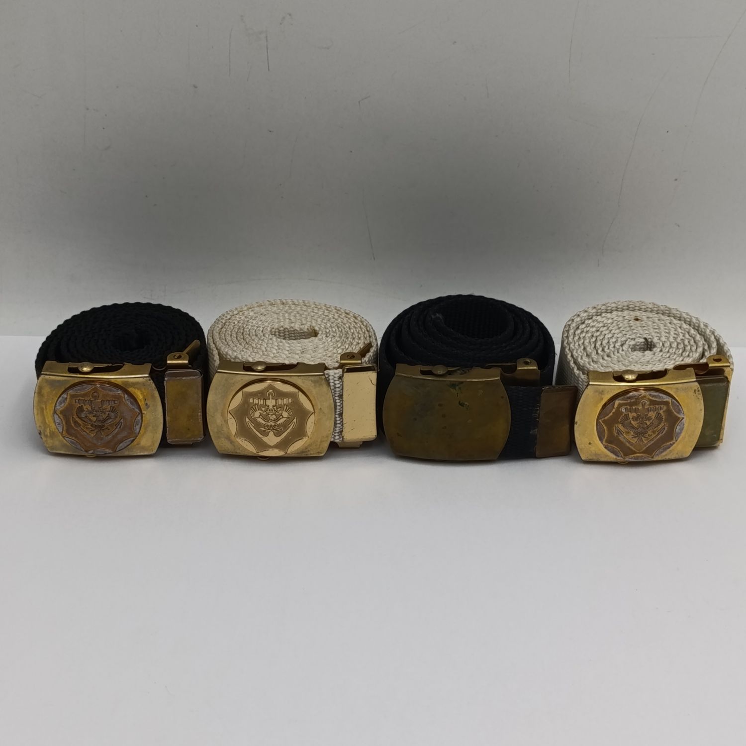 Lot of 4 South African Navy belts - 3 buckels with badges