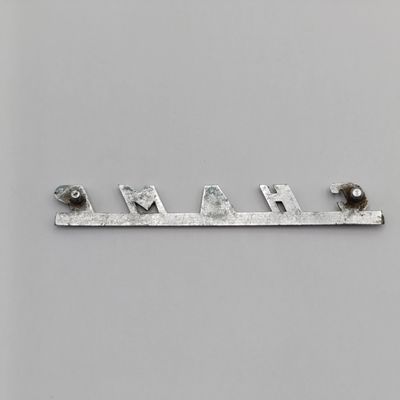 Vintage Nissan Champ car badge