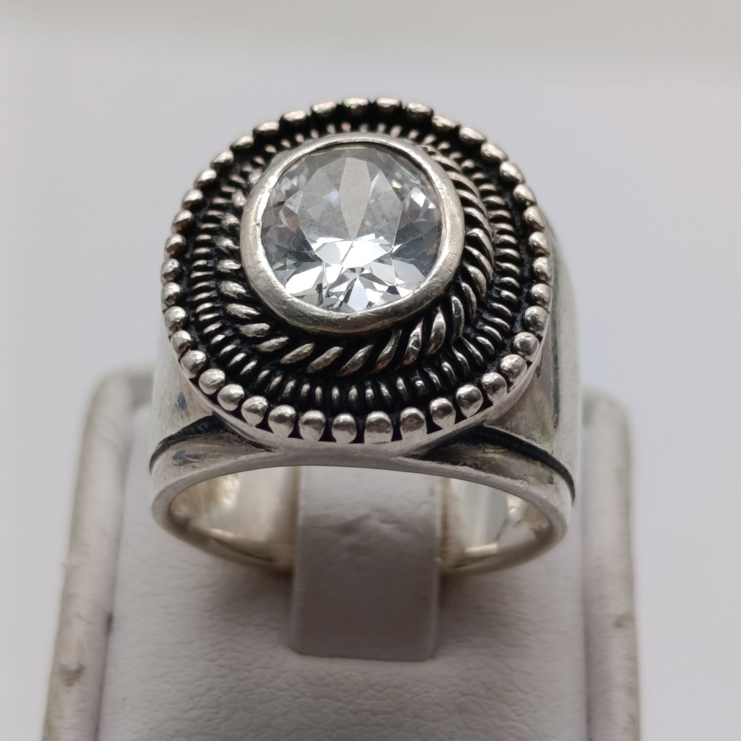 Sterling silver ring with clear stone - weight over 10g - size M