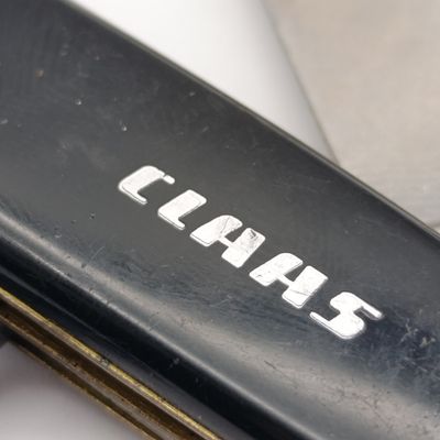 Vintage Inox Solingen 6 tool pocket knife with CLAAS advertising
