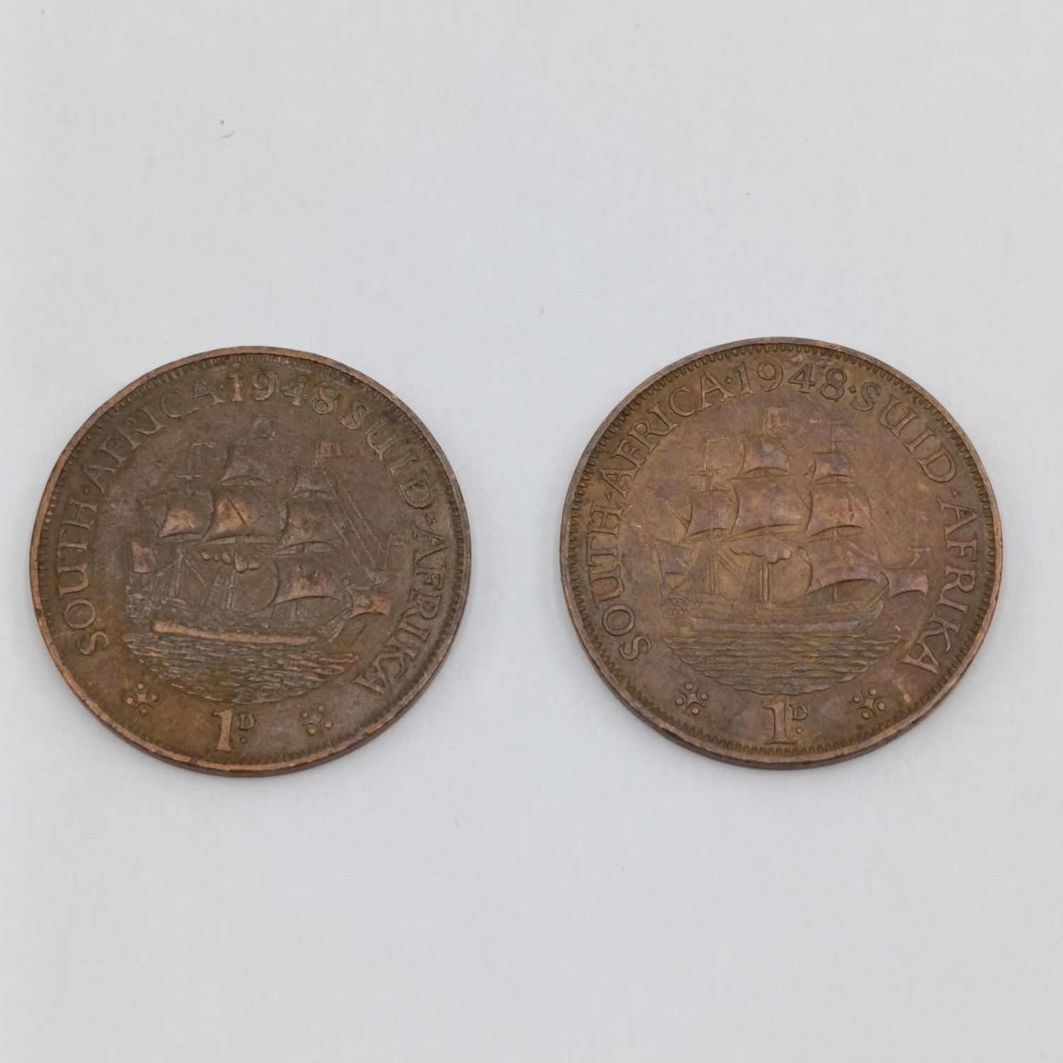 South Africa Pair of 1948 pennies - one is no stop after 8 variation