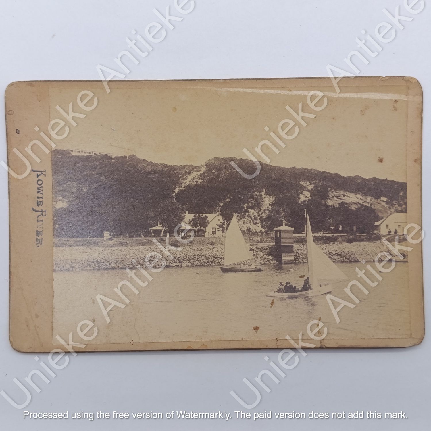 Antique photo of some boats sailing on the Kowie river