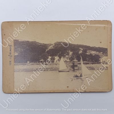 Antique photo of some boats sailing on the Kowie river