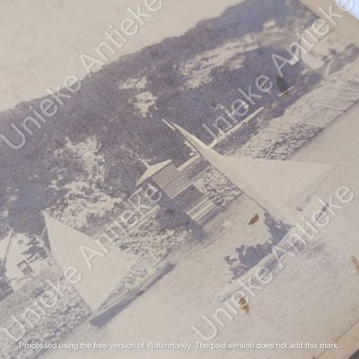 Antique photo of some boats sailing on the Kowie river