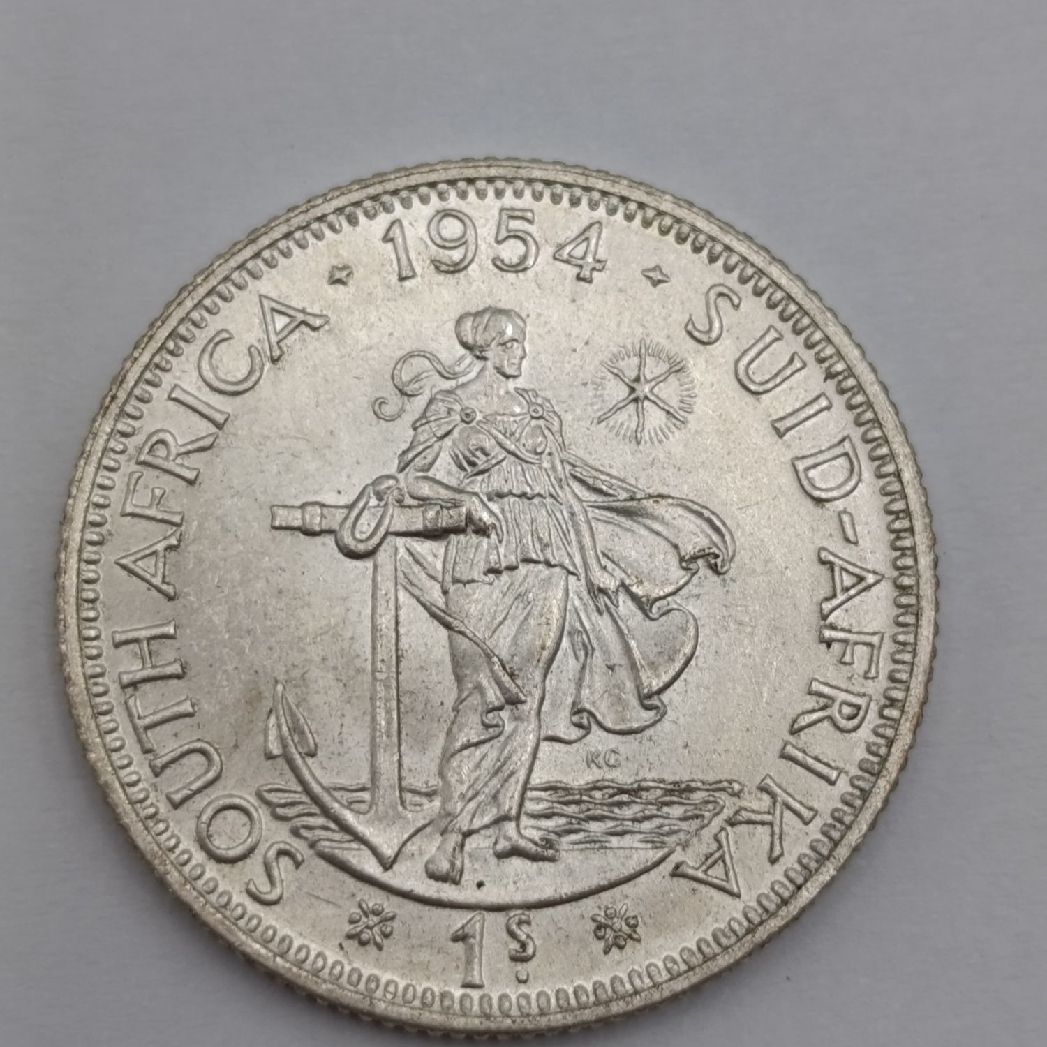 1954 South Africa silver shilling UNC
