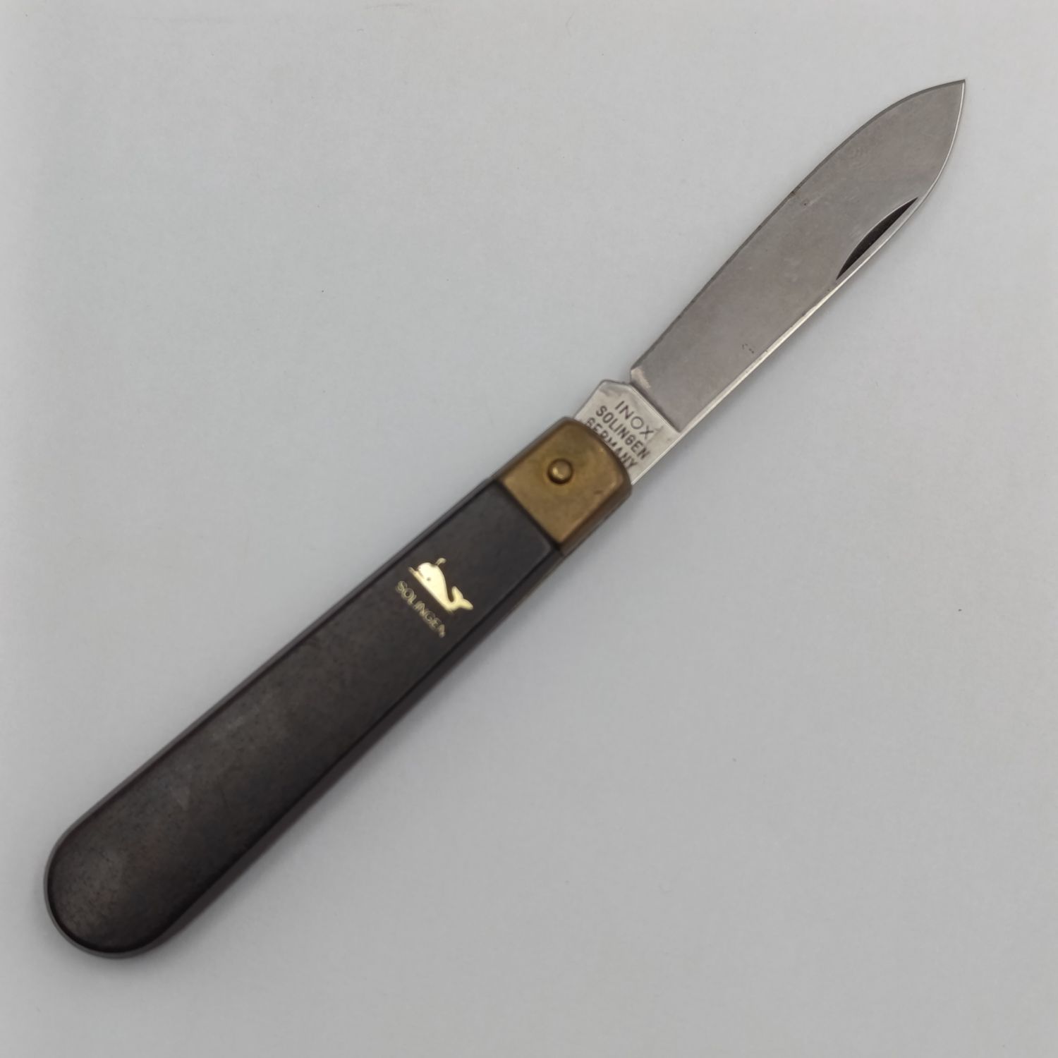 Beautiful vintage Inox Solingen pocket knife with wooden handle