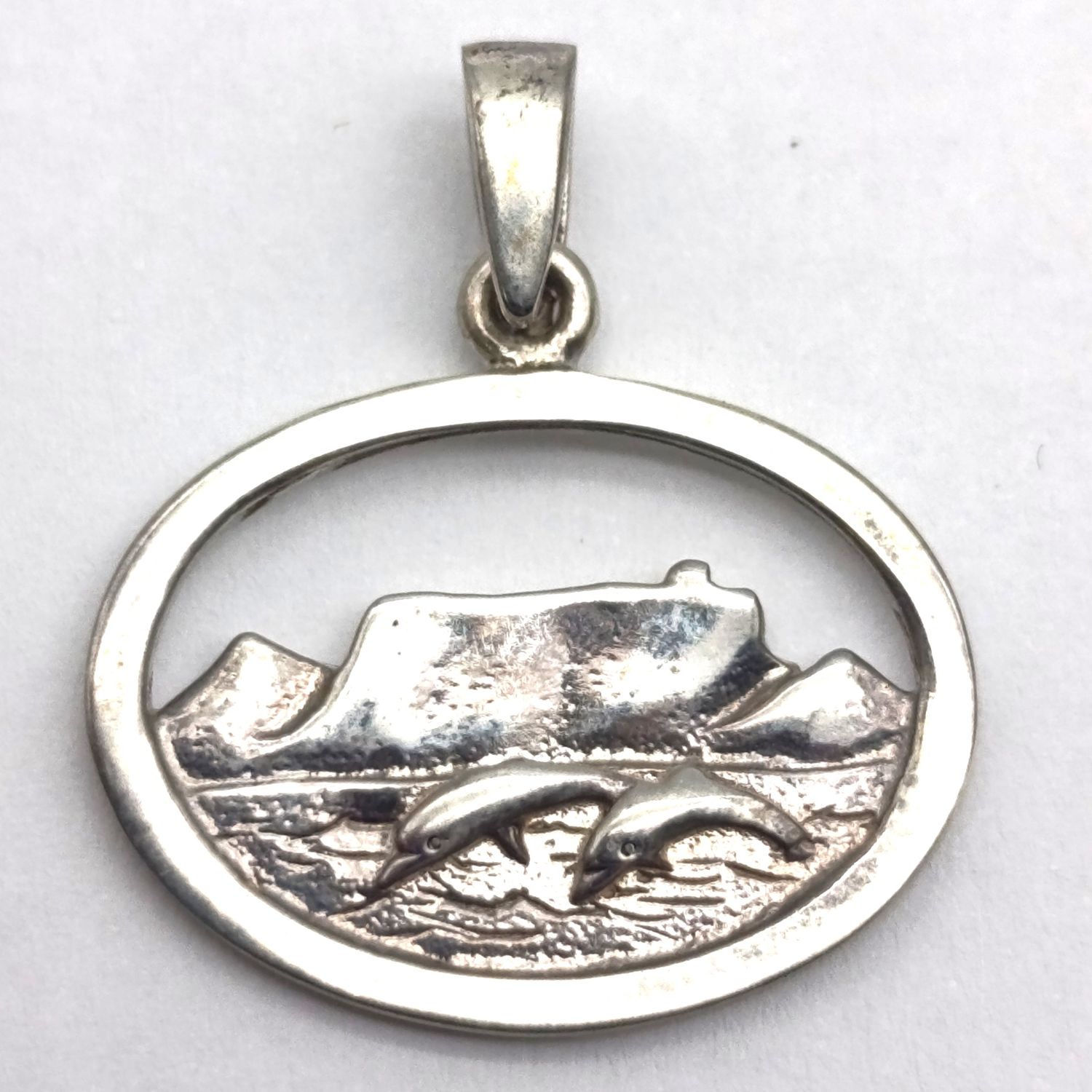 Sterling silver Stuart Benade table mountain and dolphins pendant