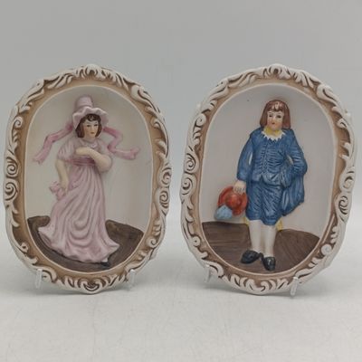 Pair of Antique Bisque wall plaques - handpainted - Little Blue Boy and Pinkie