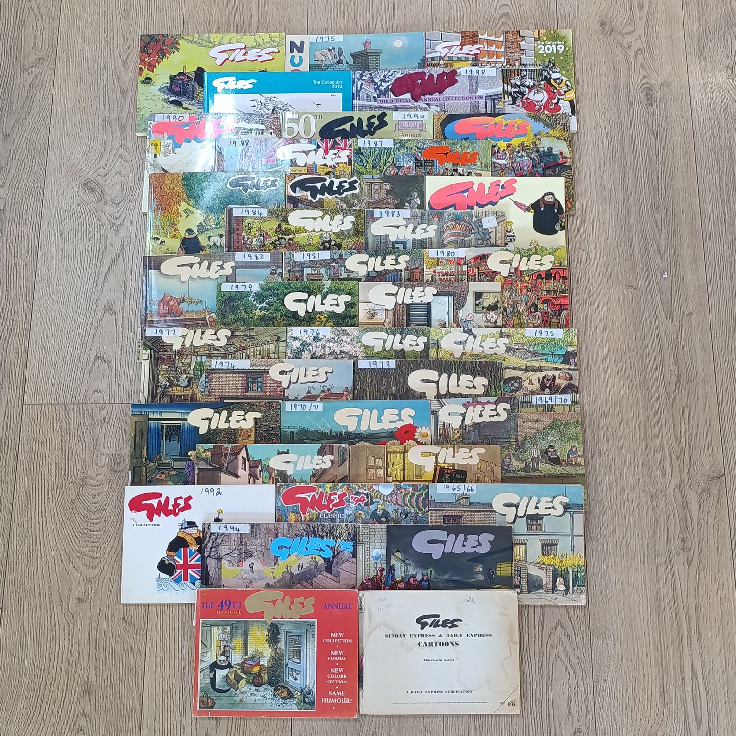 Collection of 37 vintage Giles cartoon books