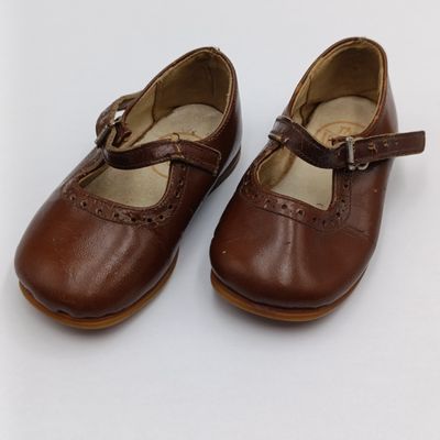 Pair of vintage The Arcadian Junior leather toddler shoes