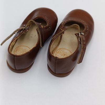 Pair of vintage The Arcadian Junior leather toddler shoes