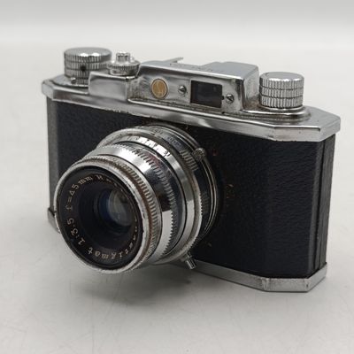 Vintage Halina 35X film camera with leather pouch - Shutter working