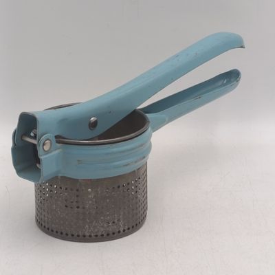 Vintage potato masher kitchen tool