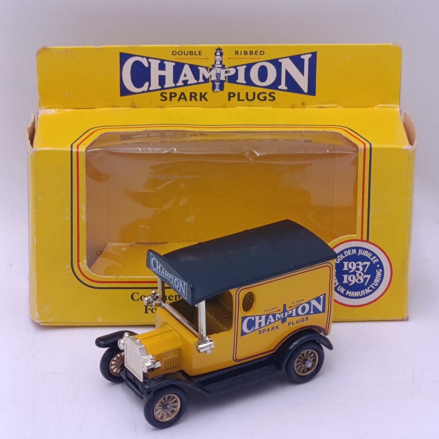 Lledo 1928 Ford Model T delivery van with CHAMPION Spark Plugs advertising in box