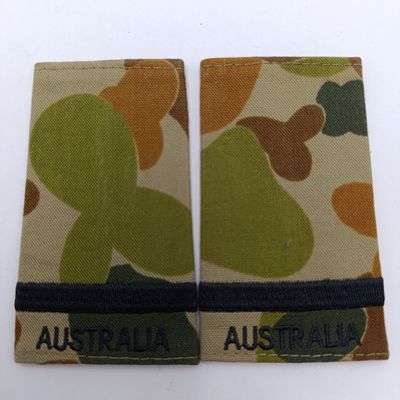 Pair of Royal Australian Air Force camo flying officer rank epaulettes