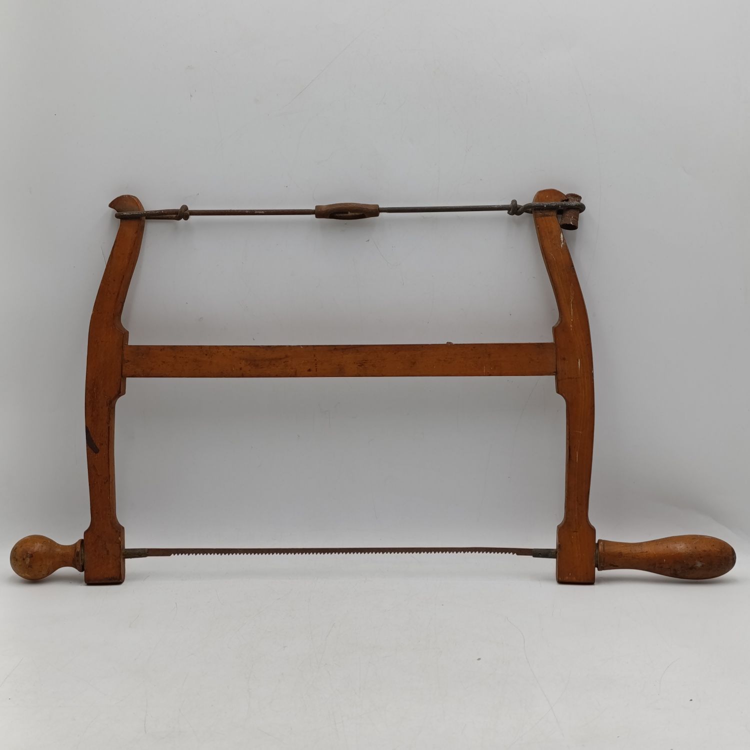 Antique wooden bow saw