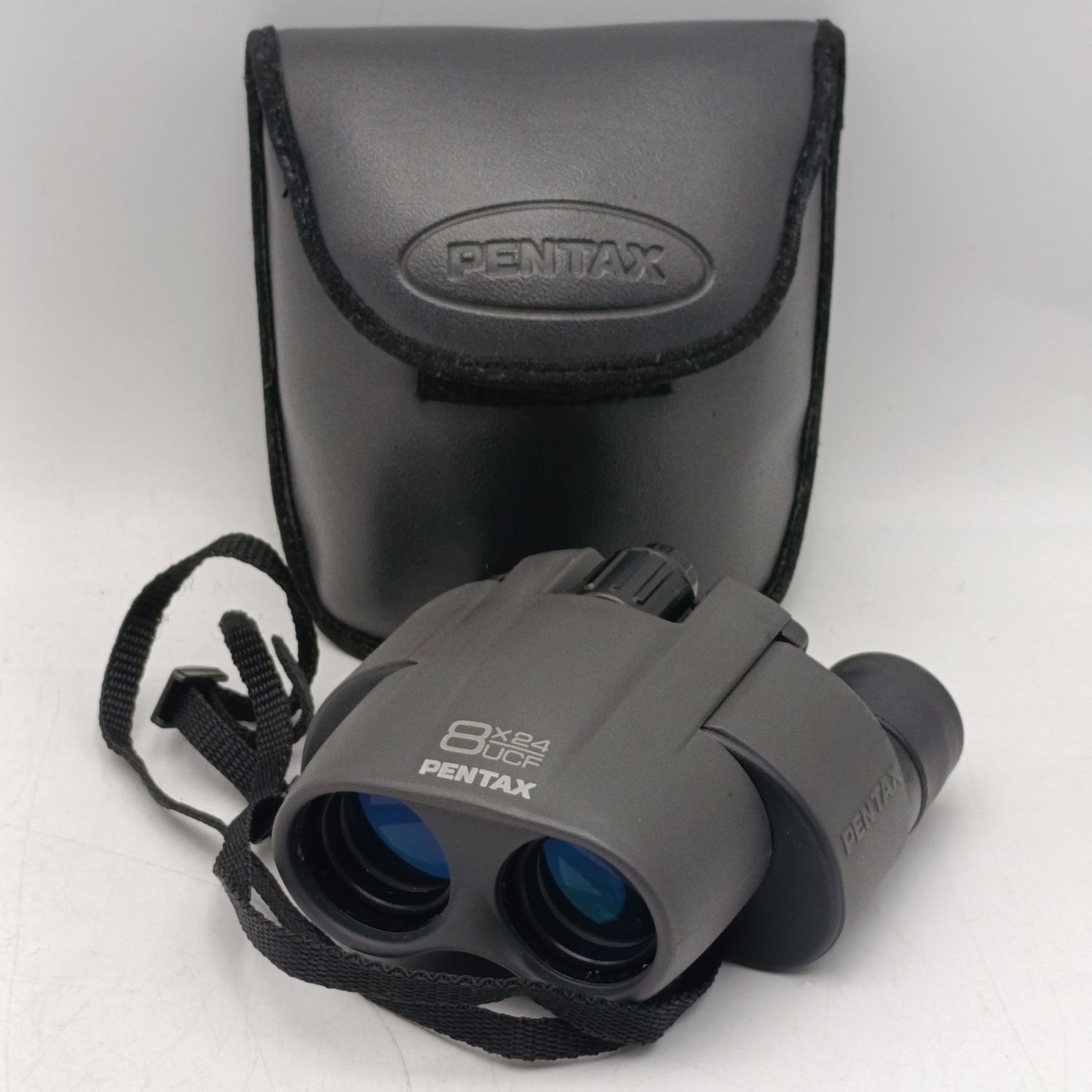 Pentax 8x24 UCF binoculars in pouch - very good condition