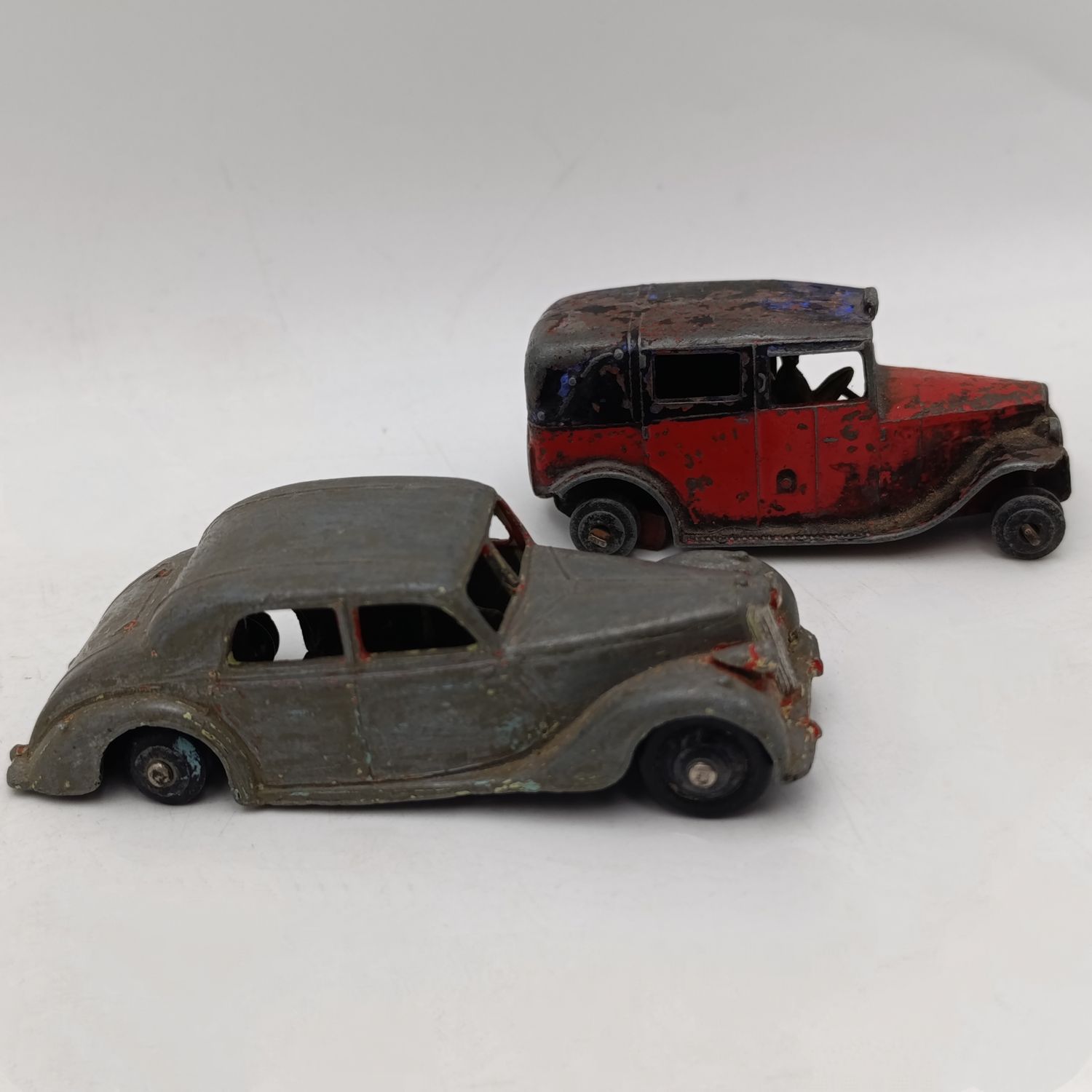 Pair of vintage Meccano Dinky Toys die-cast toy cars - well used