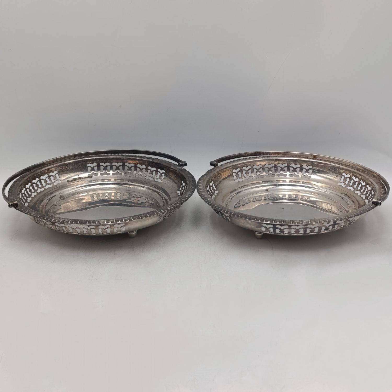 Pair of identical vintage silver-plated bowls with handles