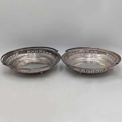 Pair of identical vintage silver-plated bowls with handles