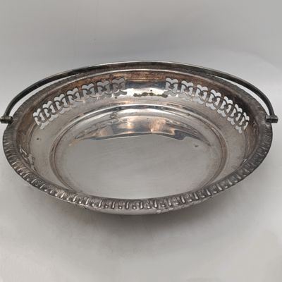 Pair of identical vintage silver-plated bowls with handles