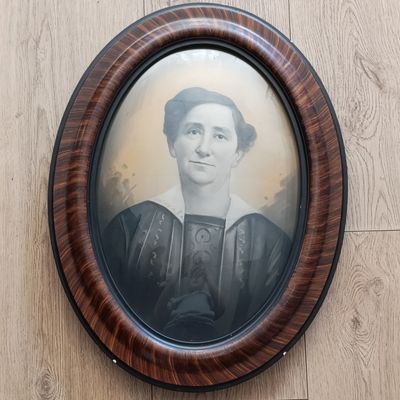 Antique bubble glass portrait with frame