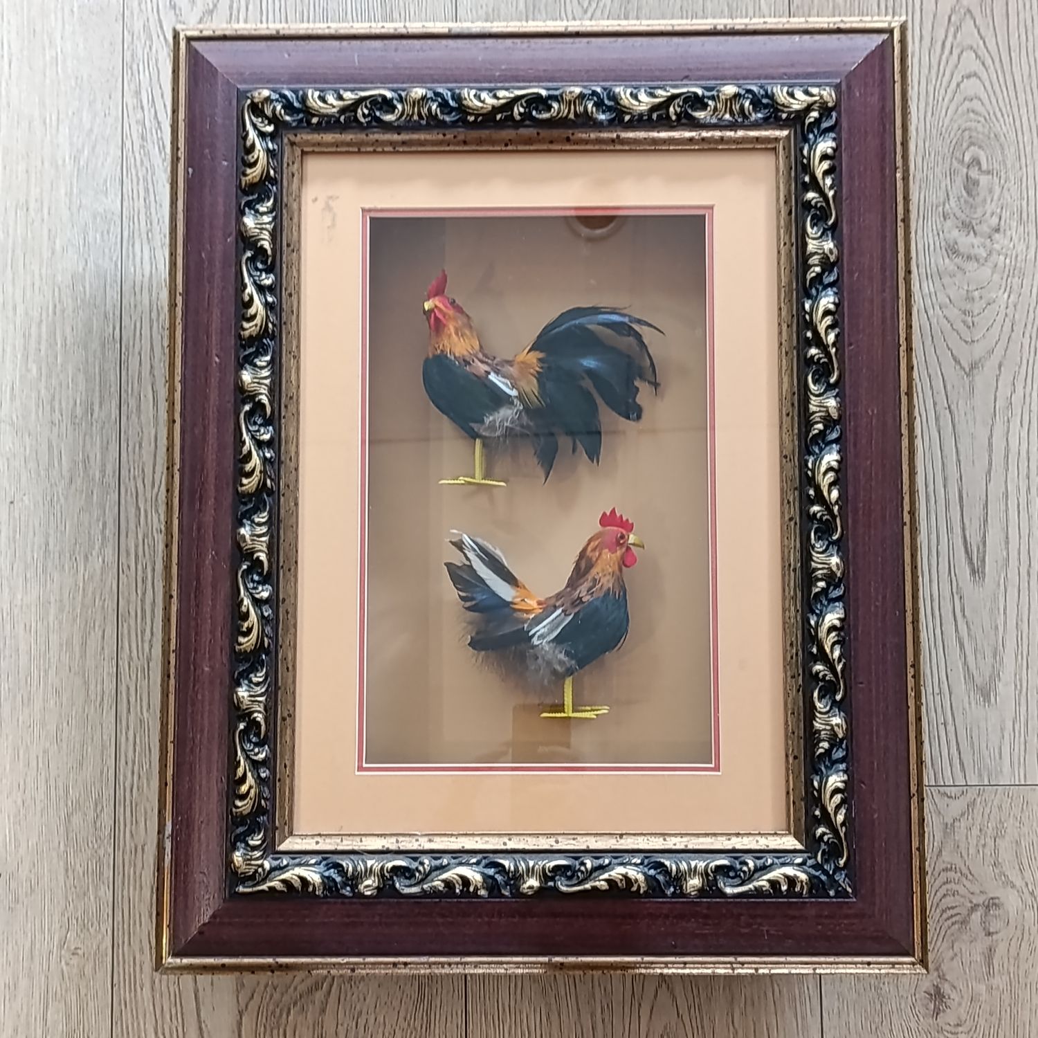 Pair of boxed framed cockerels - made from feathers