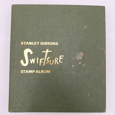 Swiftsure stamp album with over 1000 antique and vintage stamps