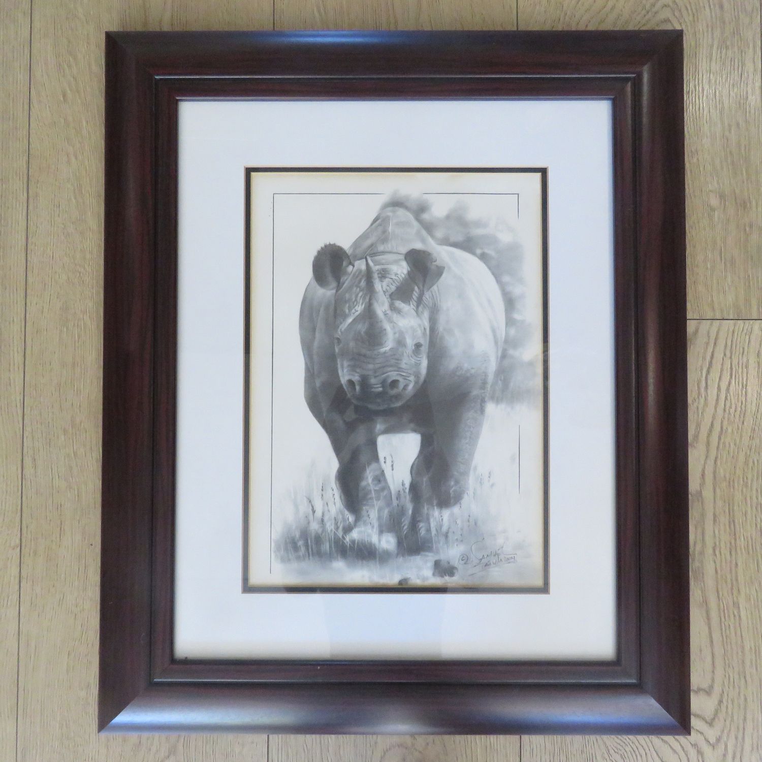 Beautiful Rhino print in frame by Samuel Tafula