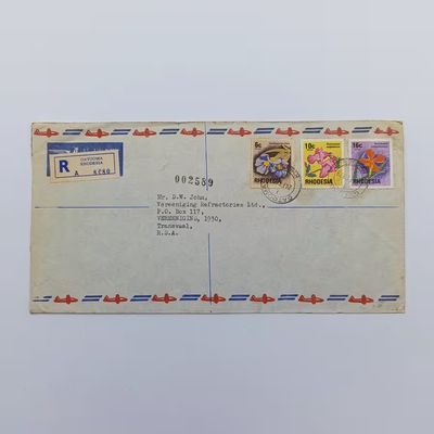 Registered postal cover from Gatooma, Rhodesia to Vereeniging, South Africa with 3 Rhodesia flower stamps cancelled 24 February 1978 - Gatooma via Salisbury to Vereeniging backstamps