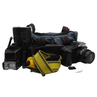 Nikon F-401s 35mm film camera with 50mm lens - plus 80-200mm zoom lens, Sakar 3x tele converter, Speedlight SB-22 flash, nikon camera slings and camera bag - Camera was tested without film and shutter