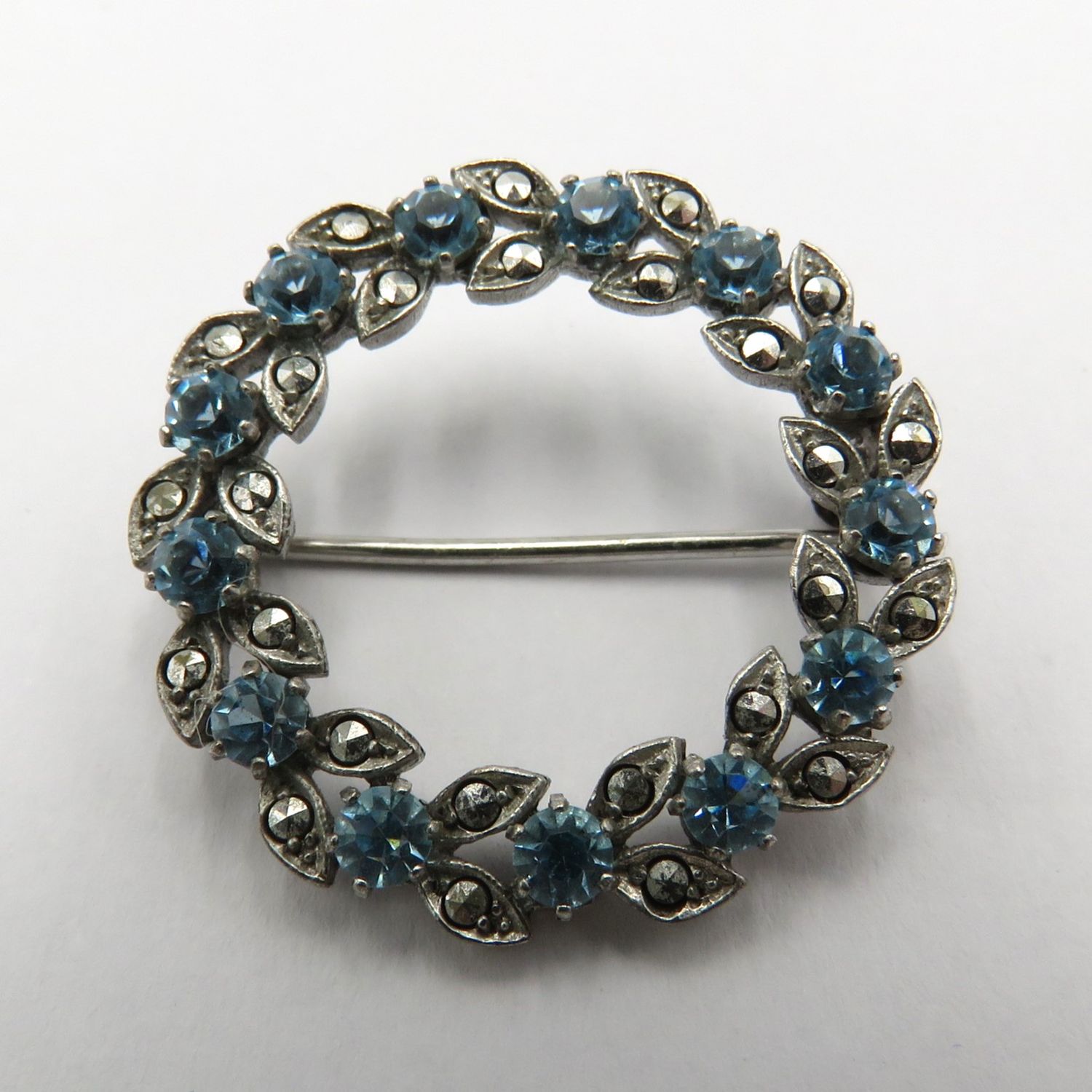 Vintage Sterling silver brooch with marcasite and blue stones - weighs 5.1 grams