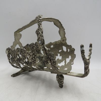 Vintage silverplated vintner motif wine bottle stand