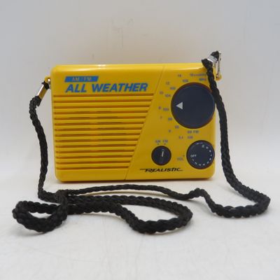 Realistic All-Weather AM/FM portable radio - working