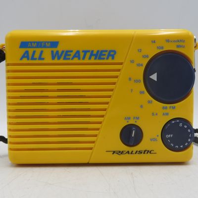 Realistic All-Weather AM/FM portable radio - working