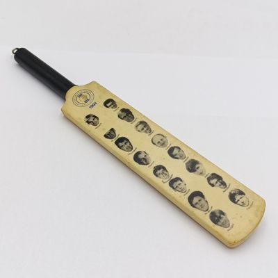 1994 United Cricket Board South African cricket team miniature cricket bat with photos of each player
