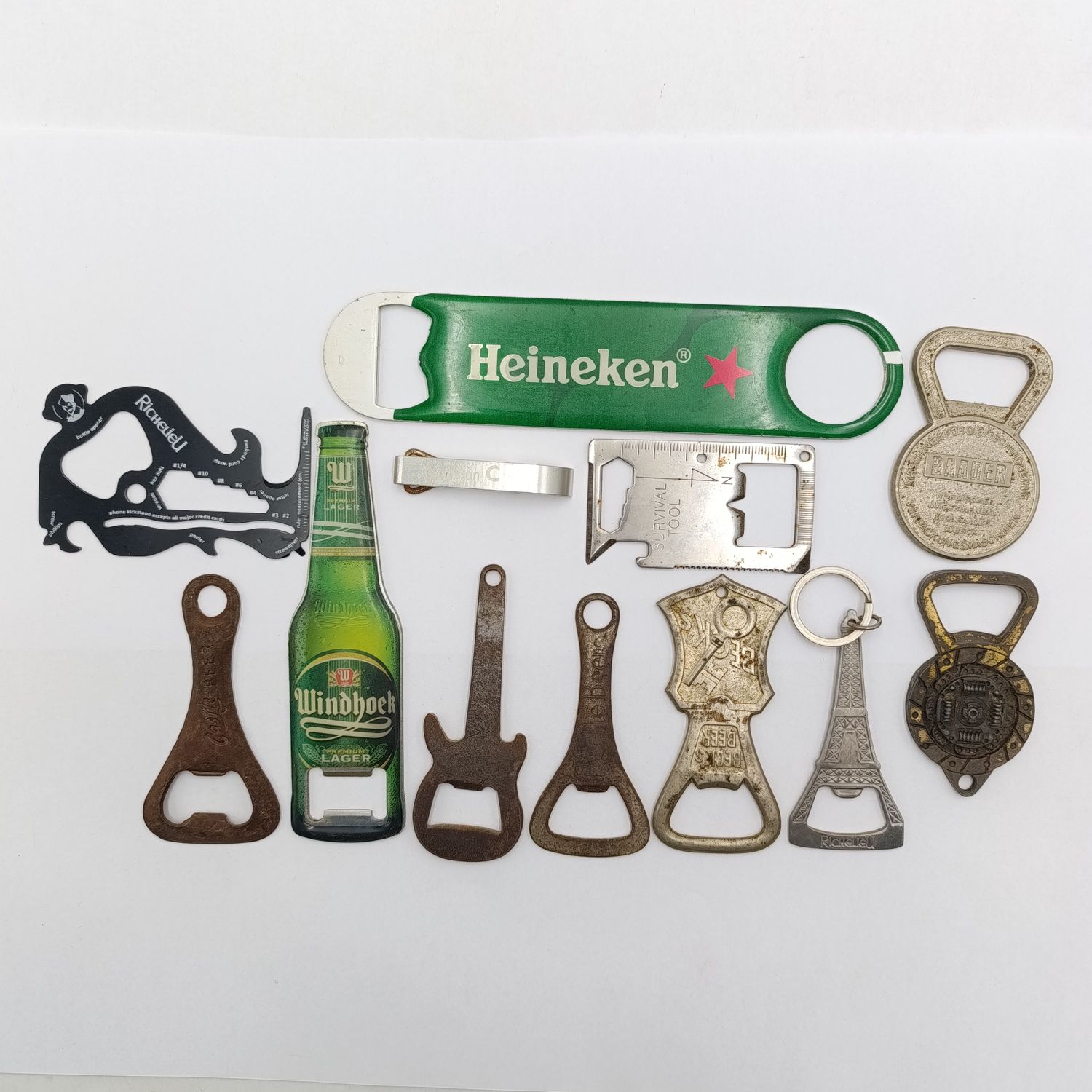 Large lot of various bottle openers