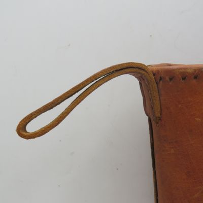 Vintage leather wine bottle sleeve