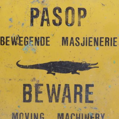 Vintage Beware Moving Machinery sign with Alligator - Plastic on metal sign