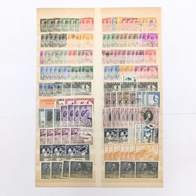 Malaya Trengganu page with over 150 stamps - both used and mint